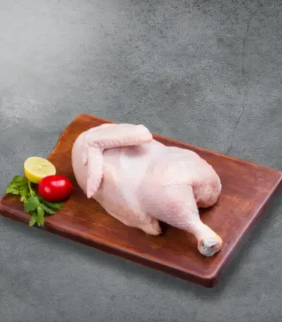 Haritha Hari Half Chicken with a tomato and a lime