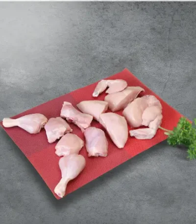 Haritha Hari Pre cut chicken skinless on a red plate