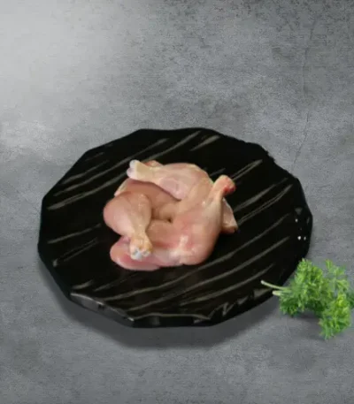 Haritha hari skinless chicken legs on a black plate